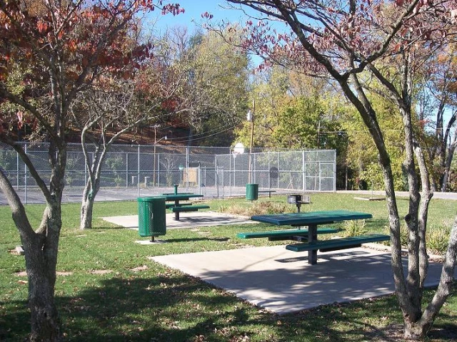 The fenced in basketball court in Centennial Park.