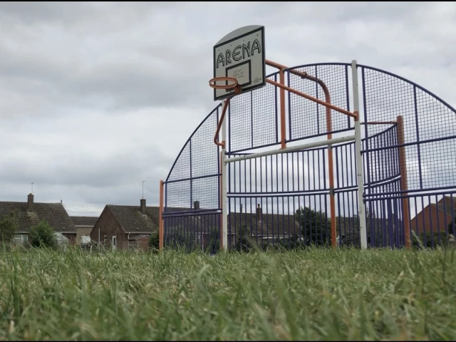 Profile of the basketball court Park hoop., Northampton, United Kingdom