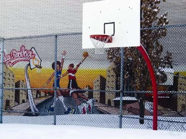 The basketball court at Parc Martel in Winter.